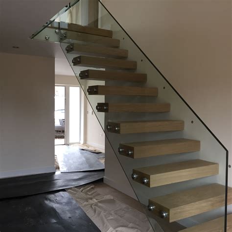 Floating Staircase With Frameless Glass Balustrade Supplied And Fitted