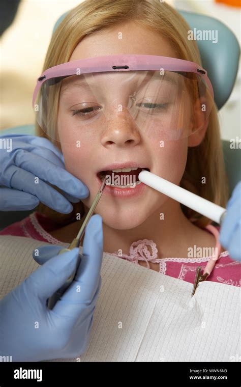 Girl Getting Dental Checkup Stock Photo Alamy