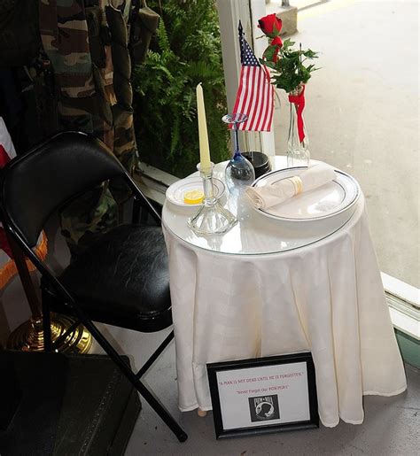 As you entered the banquet hall this evening, you may have noticed a small table in a place of honor. pow mia table | Flickr - Photo Sharing!