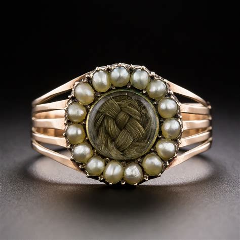victorian mourning ring with woven hair and seed pearls