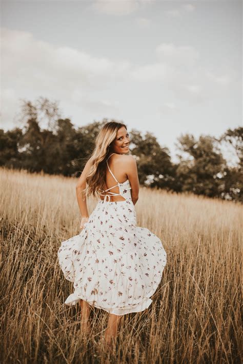 Warm Senior Photos In Field Flowy Dress For Senior Session Windy