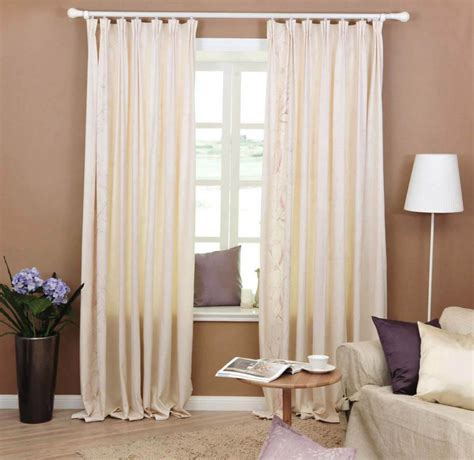 How about trying something as decorative as the golden curtain idea shown below? 20 Best Curtain Ideas for Living Room 2017 - TheyDesign.net - TheyDesign.net