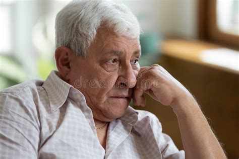Sad Grandfather Put Head On Hand Lost In Thoughts Stock Image Image