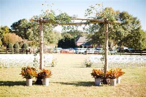 Rustic Wooden Wedding Arch With Wildflowers