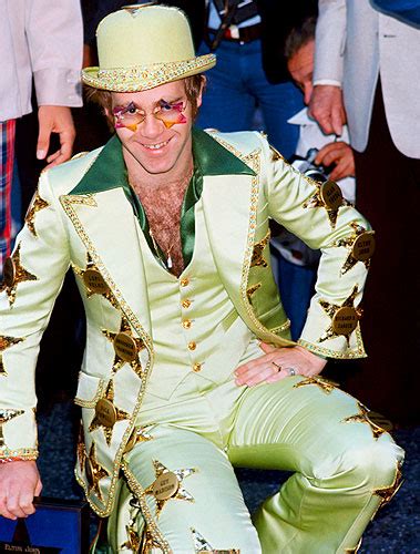 See all the sunglasses, animal costumes and chest hair from 1973 on. elton john´s pics: Photos: Elton John's Outfits Through ...