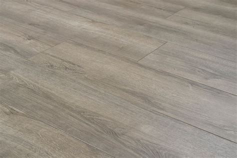 Engineered oak flooring on the other hand is made from real wood and its appearance is identical to a solid hardwood floor. Audacity 12mm Laminate Flooring Sterling Oak | Laminate ...