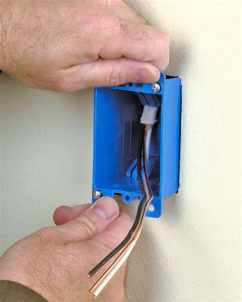 How To Install A Junction Box For A Wall Light Fixture 1mark