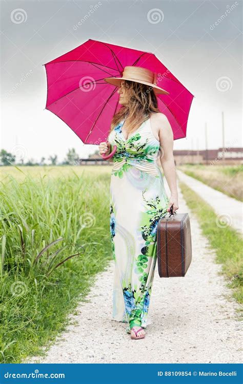 Beautiful Lady Walking On A Path In The Rain Stock Photo Image Of