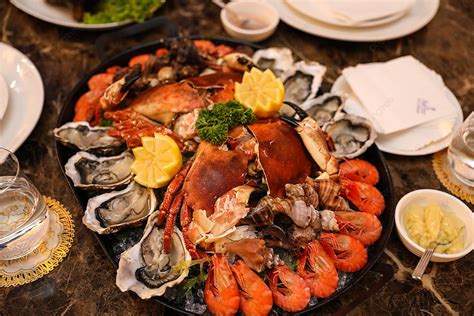 طبق لذيذ من المأكولات البحرية الخلفية طبق مأكولات بحرية وجبة عشاء مأكولات بحرية صورة الخلفية