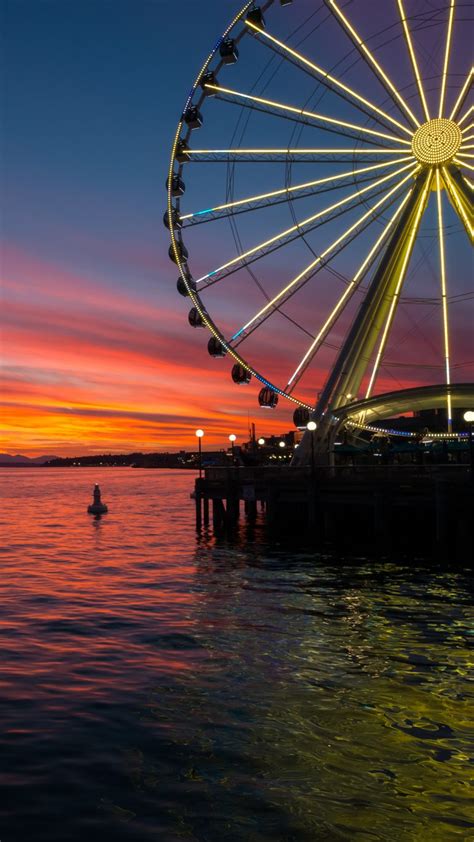 Sunset Over Seattle Great Wheel In Elliott Bay Washington Usa