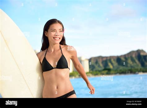Portrait Of Surfer Woman On Waikiki Beach Oahu Hawaii Female Bikini Girl Running With