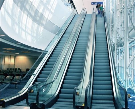 An escalator is a conveyor transport device for transporting people, consisting of a staircase whose steps move up or down on tracks that keep the surfaces of the individual steps horizontal. ELEVATOR SOLUTION LIMITED: Escalator