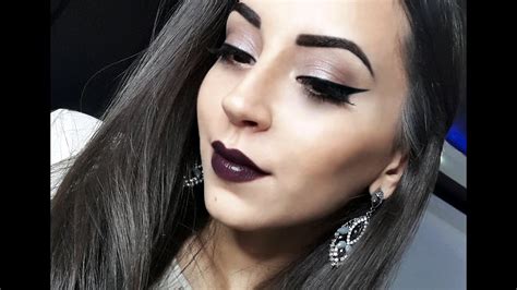Dramatic Eyeliner And Dark Purple Lips Vampy Makeup