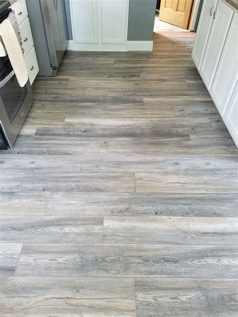 This green with gray undertone mostly used in any country, classic or vintage style decor, but you can use it as well in modern or contemporary decor. Tile Look Laminate Flooring | GoodDesign