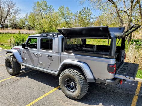 Leitner designs had a large hard shell tent mounted to their overland gladiator on display. (2020+) Jeep Gladiator Cap/Canopy | RLD Design USA