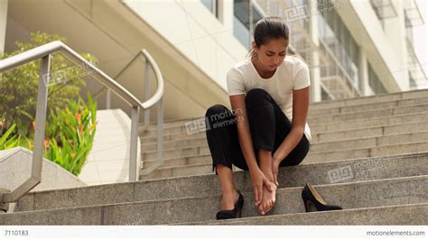 Business Woman Walking On High Heels Feeling Pain At Feet Lizenzfreie