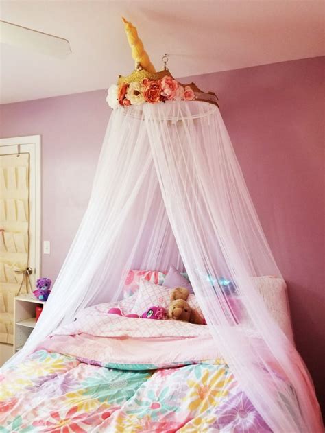 Check out these adorable, creative and fun girls' bedroom ideas. Bed canopy from Bed Bath and Beyond. Unicorn crown crafted ...