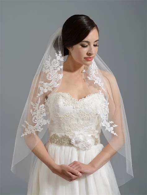 Here is some background info Ivory elbow wedding veil V051n alencon lace