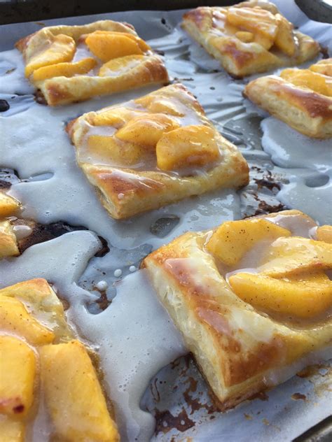 Peach tartlets with juicy peaches, toasted almonds & vanilla glaze over a flaky crust. Peach Puff Pastry Tart | Recipe | Peach puff pastry, Puff ...