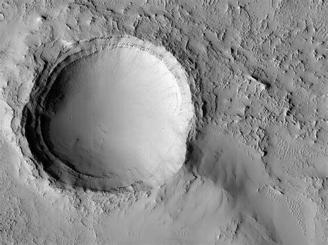 Martian Cassini Crater Looks Like An Eerily Smooth Bowl From High Up In