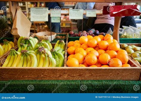 Display Of Bananas And Oranges In Organic Farm Shop Stock Photo Image