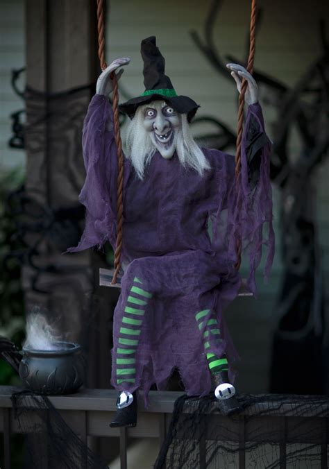 Cartoon witch legs wearing pink boots with high heel and curled toes. Decoration Swinging Witch