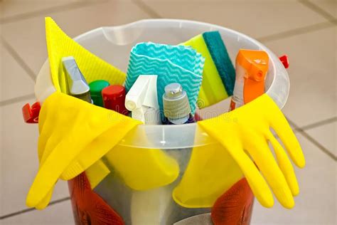 Household Cleaning Tools And Products In A Plastic Bucket Stock Image