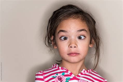 Little Girl With Funny Face By Stocksy Contributor Ronnie Comeau