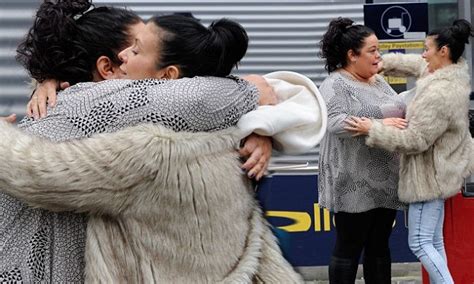 Kym Marsh And Lisa Riley Embrace At Manchester Airport
