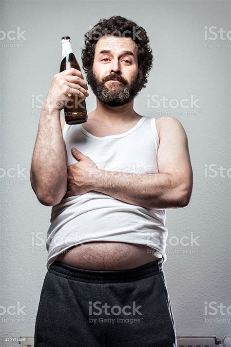 Bearded Beer Man Posing With His Bottle Stock Photo Download Image
