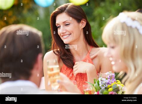 Female Guest At Wedding Reception Stock Photo Alamy