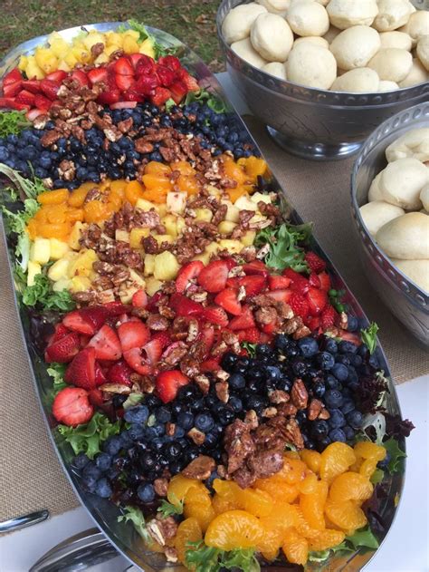 Mixed Greens Salad With Fresh Fruit And Praline Pecans Catering By
