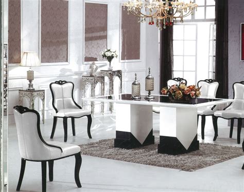 How about white chairs and black table now that you painted a coat of black on the table? Barcelona Marble Dining Table with 8 Chairs | Marble King