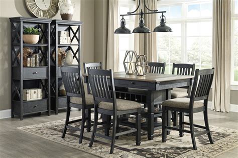 Slat back and tapered legs are a sturdy frame. Tyler Creek Counter Dining Room Set Signature Design ...
