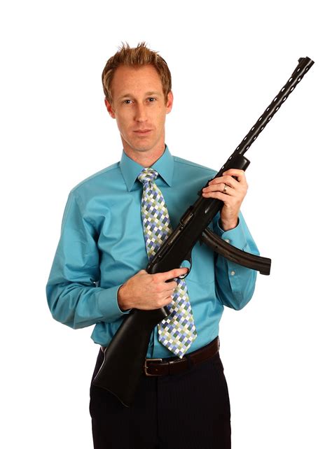 Rifle Free Stock Photo A Young Businessman Holding A Rifle 13306