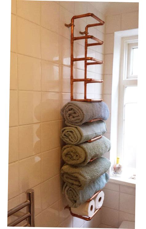 Bath towel drying racks allow the convenience of having your towels close at hand while also offering practicality in terms of keeping them dry and even warm. Bathroom Towel Storage Ideas Creative 2016 - Ellecrafts