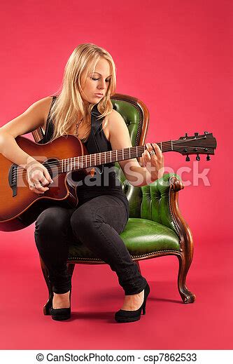 Attractive Female Guitar Player Photo Of A Female Guitarist Playing