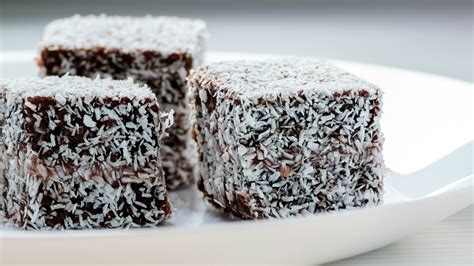 Bake a rectangular cake, cut it into 2″ (5cm) squares, then dip the cakes in chocolate frosting and roll them. Our favourite lamington recipes - Starts at 60