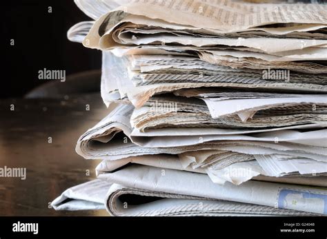 Stack Of Newspapers On Table Stock Photo Alamy