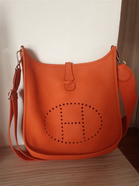 It specializes in leather goods, lifestyle accessories, home furnishings, perfumery, jewellery. Preloved 100% Authentic Designer Bags for sale: Hermes Evelyn