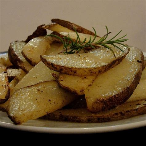 Place sliced potatoes in baking dish and cover with a paper towel. Oven-Baked Potato Slices | Recipe in 2020 | Baked potato ...