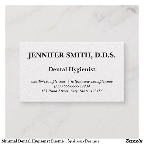 A Business Card With The Words Dentist Hygienist In Black And White On It