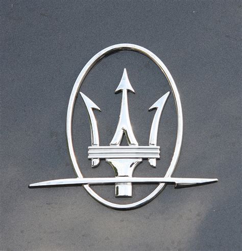 The trident logo of the maserati car company, designed by mario maserati, is based on the fountain of neptune in bologna's piazza maggiore.in 1920, one of the maserati brothers used this symbol in the logo at the suggestion of family friend marquis diego de sterlich. World Of Cars: Maserati logo Images