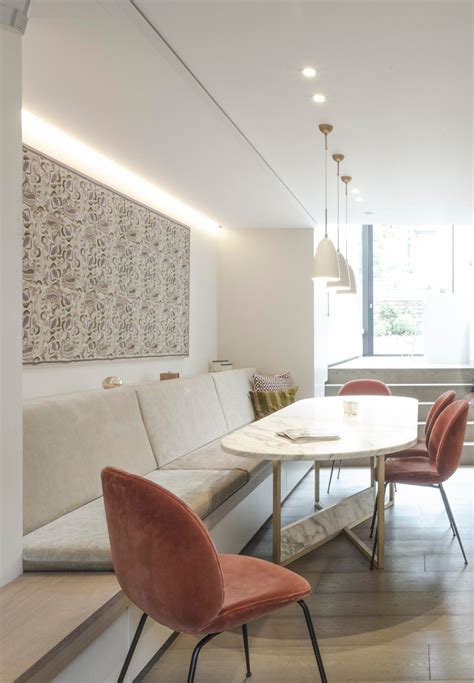 A Built In Dining Bench Saves Space Inside This Narrow House Dining