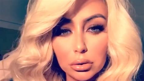 aubrey o day stuns in plunging swimsuit at the beach