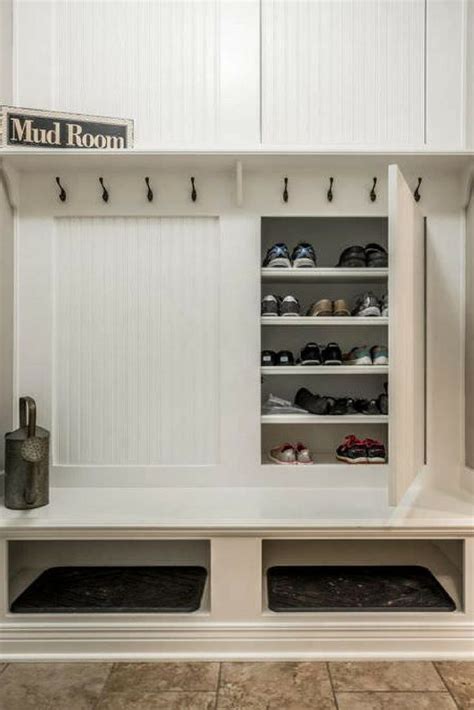 Custom Mudroom Storage With Concealed Shoe Storage 8 Hooks For Coats