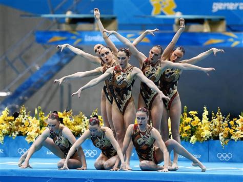 Team Russia Performs Their Routine During The Synchronized Swimming