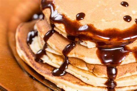 Pile Of American Pancakes With Melting Chocolate Cream Closeup Macro