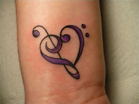 Music has been a part of human culture for centuries, and that passion has evolved into a variety of avenues since then. getting this tatt treble clef bass clef heart | Tattoo ideas!!!!! | Pinterest | Awesome tattoos ...