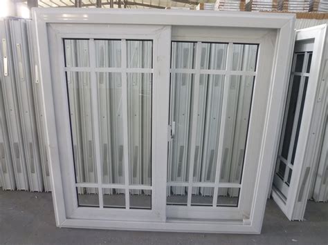 Sliding Upvc Window With Grids The Home Expo